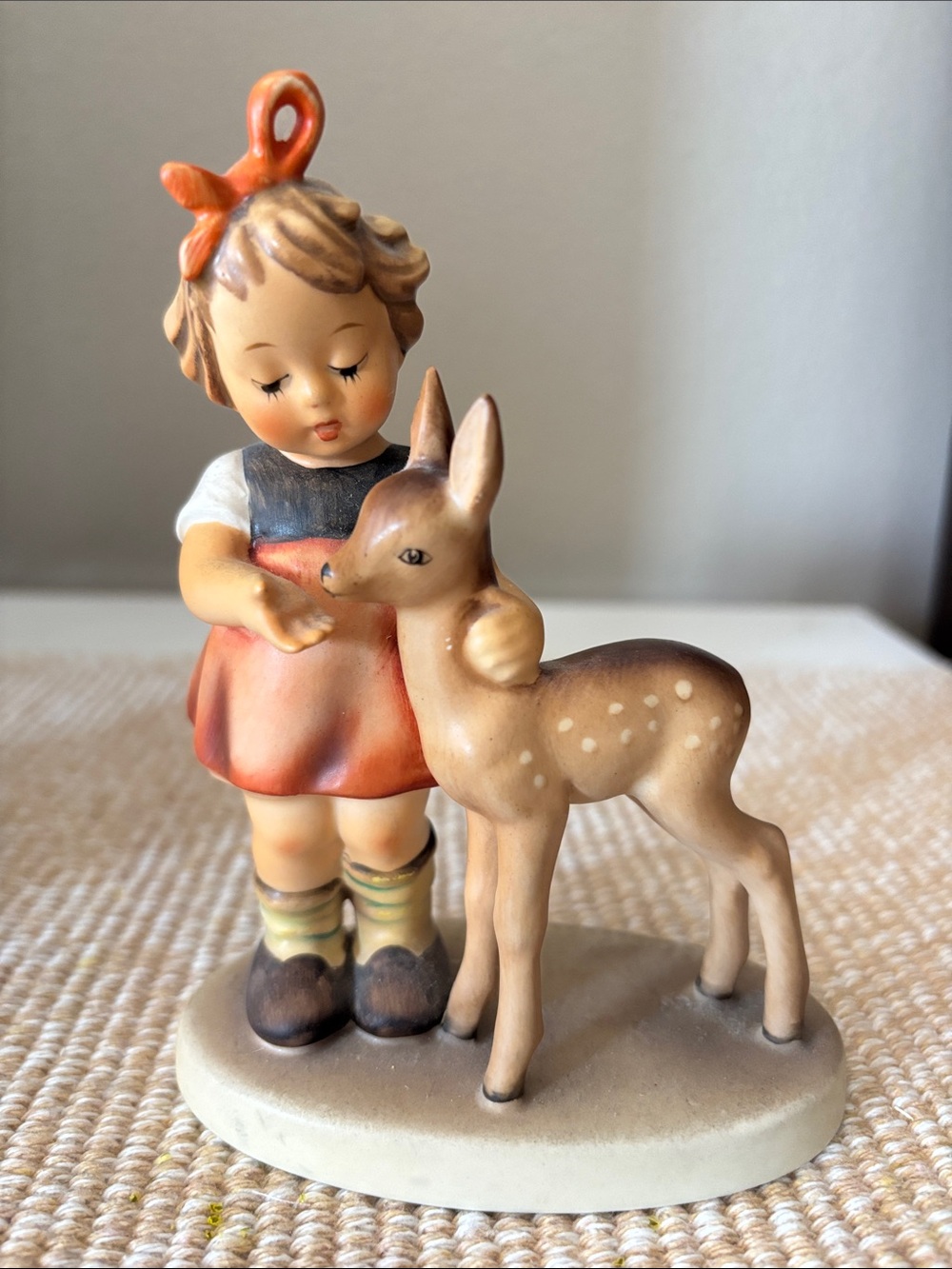 Goebel Hand-Painted Girl and Fawn Figurine in Orange and Cream